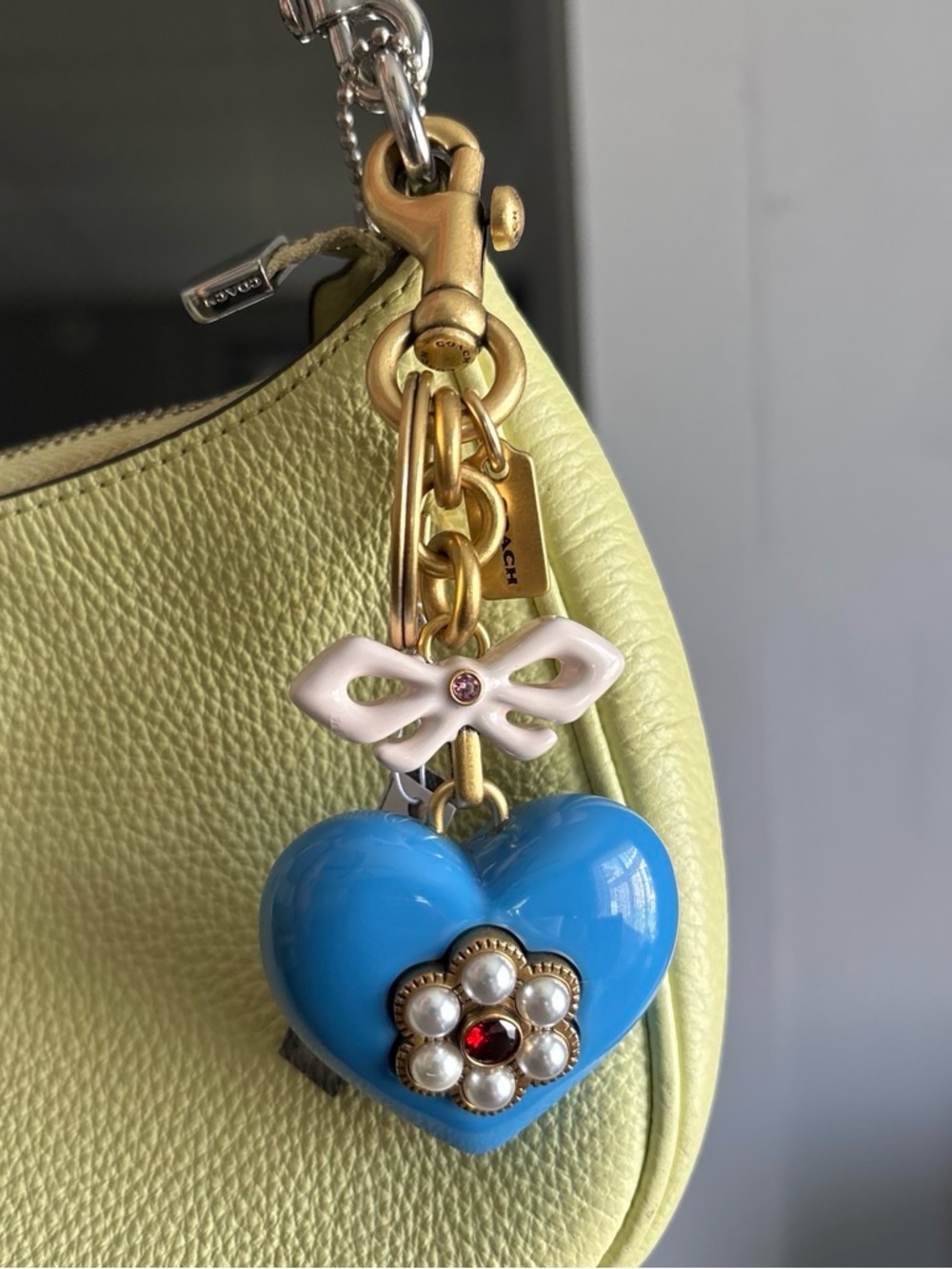 Coach Blue Heart Charm with White Bow and Gold Accents